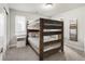 Comfortable bunk room with natural light and carpeting at 1815 Grove St, Denver, CO 80204