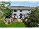Beautiful backyard with patio, fire pit, and lush landscaping perfect for outdoor living at 6095 S Oswego St, Greenwood Village, CO 80111
