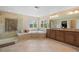 Spacious bathroom with separate shower, tub, and dual sink vanity at 6095 S Oswego St, Greenwood Village, CO 80111