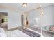 Bright bedroom boasts an ensuite bathroom at 6095 S Oswego St, Greenwood Village, CO 80111