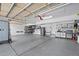 Spacious three-car garage with ample storage and organization systems at 6095 S Oswego St, Greenwood Village, CO 80111