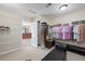 Walk-in closet features shelving, hanging rods, and full length mirror at 6095 S Oswego St, Greenwood Village, CO 80111