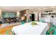 Open floor plan features a cozy living area, dining space, and modern kitchen with stainless appliances at 159 Lake Rd, Idaho Springs, CO 80452