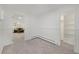 Basement room, view to finished basement with carpet at 8799 Independence Way, Arvada, CO 80005