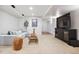 Finished basement featuring a cozy seating area and modern entertainment center at 10258 Pennington Ln, Highlands Ranch, CO 80126