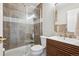 Modern bathroom with a glass shower, stylish vanity, and sleek fixtures at 10258 Pennington Ln, Highlands Ranch, CO 80126