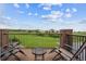 Relaxing outdoor deck with comfortable seating, offering a serene space with neighborhood views at 10258 Pennington Ln, Highlands Ranch, CO 80126