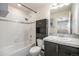 Updated bathroom featuring stylish vanity, modern fixtures, and tiled shower at 1732 Aspen Meadows Cir, Federal Heights, CO 80260