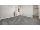 Spacious bedroom with neutral paint and soft gray carpet at 1732 Aspen Meadows Cir, Federal Heights, CO 80260