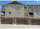Modern townhome with private balconies and attached garages, offering comfort and convenience at 1732 Aspen Meadows Cir, Federal Heights, CO 80260