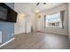 Spacious living room featuring hardwood floors, high ceilings and ample natural light at 1732 Aspen Meadows Cir, Federal Heights, CO 80260