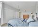 Inviting bedroom featuring a bed, dresser, and closet at 2700 E Cherry Creek South Dr # 220, Denver, CO 80209
