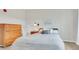 Comfortable bedroom featuring a cozy bed, dresser, and natural lighting, providing a relaxing ambiance at 2700 E Cherry Creek South Dr # 220, Denver, CO 80209