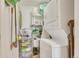Functional laundry room with stacked washer/dryer and storage shelves at 2700 E Cherry Creek South Dr # 220, Denver, CO 80209