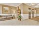 Well-maintained lobby featuring a comfortable sofa, decorative bookcase, and convenient elevator access at 2700 E Cherry Creek South Dr # 220, Denver, CO 80209