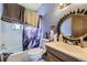 Functional bathroom with a tub, toilet, and vanity, providing essential amenities at 10932 W 107Th Ave, Broomfield, CO 80021