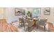 Stylish dining room featuring modern furniture, elegant decor, and plenty of natural light for enjoyable meals at 1325 Lima St, Aurora, CO 80010