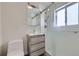 Bathroom featuring a shower and gray vanity at 3420 Tennyson St # 105, Denver, CO 80212