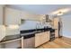 Well-appointed kitchen featuring stainless steel appliances and sleek black countertops at 3420 Tennyson St # 105, Denver, CO 80212