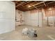 Unfinished basement with exposed ceiling, wrapped walls, and cement flooring; ready for customization and expansion at 6196 Oxford Peak Ln, Castle Rock, CO 80108