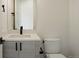 Contemporary powder room with stylish vanity and modern fixtures at 6196 Oxford Peak Ln, Castle Rock, CO 80108