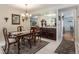 Formal dining room with elegant chandelier at 10000 E Yale Ave # 7, Denver, CO 80231