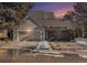 Charming two-story home with a well-maintained lawn, complemented by a two-car garage at 10000 E Yale Ave # 7, Denver, CO 80231