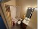 Well-lit bathroom with a shower-tub combination, vanity, and neutral color scheme at 2874 Rose Hill St, Strasburg, CO 80136
