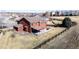 Aerial perspective of a home with a spacious yard, covered patio, and surrounding residential landscape at 2954 E 108Th Dr, Northglenn, CO 80233