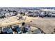 A beautiful aerial view features a house with a spacious yard next to a walking path and a park at 2954 E 108Th Dr, Northglenn, CO 80233