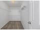 Walk-in closet with carpeted floor and shelving offering ample storage space at 2954 E 108Th Dr, Northglenn, CO 80233