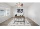 Bright home office with modern desk, neutral decor, and great natural light at 2954 E 108Th Dr, Northglenn, CO 80233