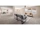 Spacious living area with a partial view of dining area, cozy seating, and ample natural light at 2954 E 108Th Dr, Northglenn, CO 80233