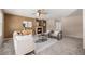 Well-lit living room with comfortable seating, modern decor, and an inviting fireplace at 2954 E 108Th Dr, Northglenn, CO 80233