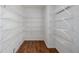 Spacious walk-in pantry with custom shelving provides plenty of storage at 2954 E 108Th Dr, Northglenn, CO 80233