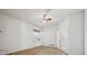 Bedroom boasts bright natural light and double doors to another room at 23312 E Chestnut Pl, Aurora, CO 80016