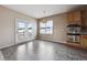 Bright dining area with a tile floor, patio access, and large window allowing ample natural light at 23312 E Chestnut Pl, Aurora, CO 80016