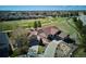 Charming exterior of a home near a golf course featuring a well-manicured lawn, driveway and mature trees at 23312 E Chestnut Pl, Aurora, CO 80016