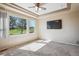 Bright bedroom with large windows, a trey ceiling, and a ceiling fan that offers plenty of natural light at 23312 E Chestnut Pl, Aurora, CO 80016