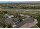 Aerial view of a home with a sprawling lot, fenced yard, landscaping and outbuilding at 14953 Akron Ct, Brighton, CO 80602