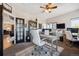 Spacious office with lots of room, built in bookcases, and an abundance of natural light at 14953 Akron Ct, Brighton, CO 80602