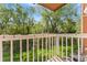 A balcony with views of lush greenery, perfect for enjoying the outdoors in a private setting at 580 Vance St # A, Lakewood, CO 80226