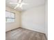 Neutral carpet, ceiling fan, and window with blind offers a cozy space at 4435 Andes Ct, Denver, CO 80249