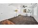 Cozy living room with plush carpet, a ceiling fan, and a staircase leading to the upper level at 4435 Andes Ct, Denver, CO 80249