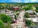 Aerial view of a town's main street with shops and restaurants at 11427 Brownstone Dr, Parker, CO 80138