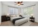 Bedroom offers a ceiling fan and windows letting in plenty of natural light at 4802 E Kentucky Ave # E, Denver, CO 80246