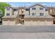 Home exterior with garages and balconies at 4802 E Kentucky Ave # E, Denver, CO 80246