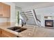 Well-lit kitchen featuring granite countertops and seamlessly integrated appliances at 4802 E Kentucky Ave # E, Denver, CO 80246