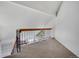 Cozy loft area with carpet flooring and views of the surrounding landscape at 4802 E Kentucky Ave # E, Denver, CO 80246