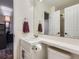 Bathroom with single sink vanity and toilet at 10141 Brady Pl, Highlands Ranch, CO 80130